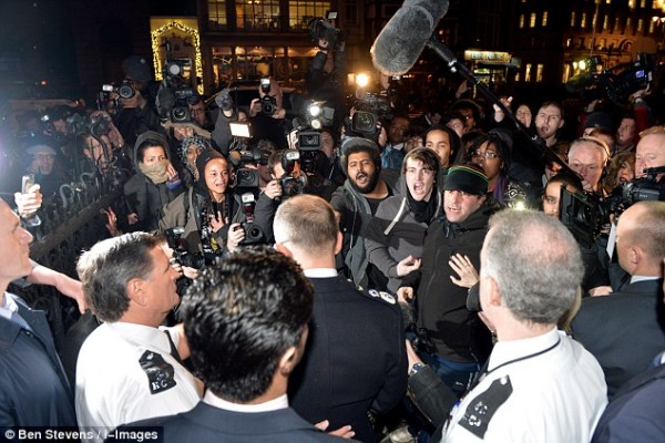 Crowds hurl abuse at Assistant Commissioner Rowley after a jury ruled that Mark Duggan was lawfully killed.